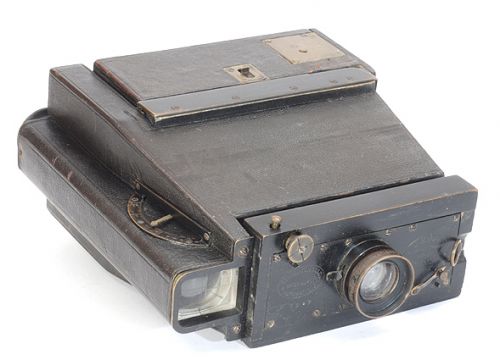 Старинный миниатюрный фотоаппарат